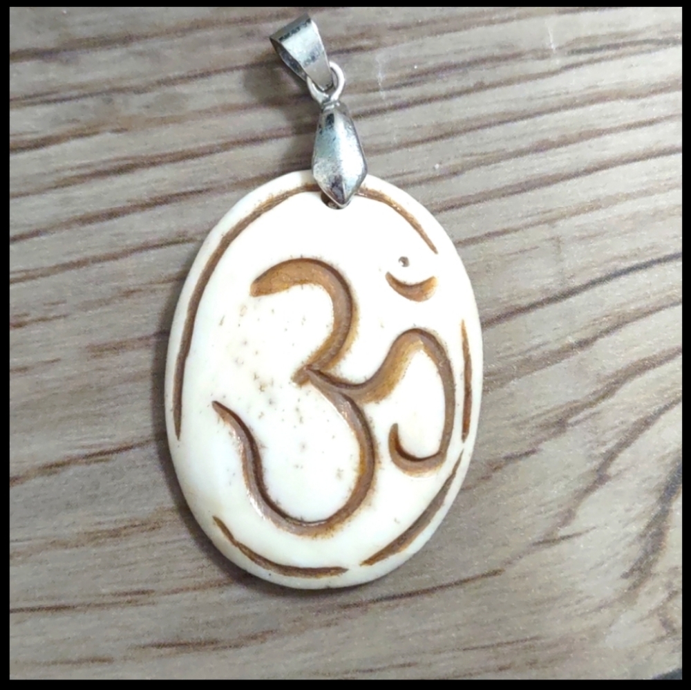 Carved Hindu Buddhist ohm pendant